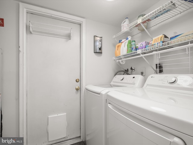 laundry room with laundry area and separate washer and dryer