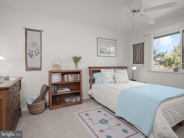 bedroom with light carpet