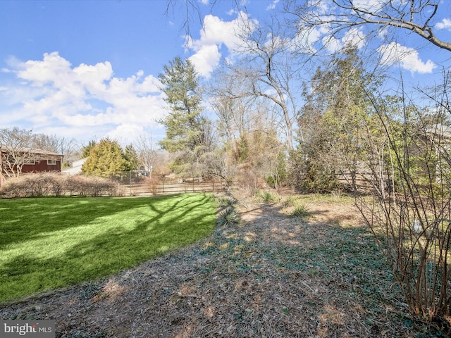 view of yard featuring fence