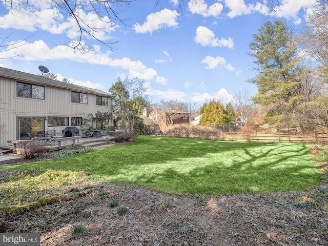 view of yard with fence