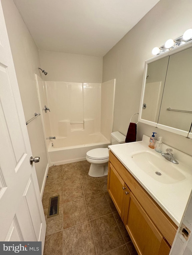 bathroom featuring bathing tub / shower combination, visible vents, toilet, vanity, and tile patterned flooring