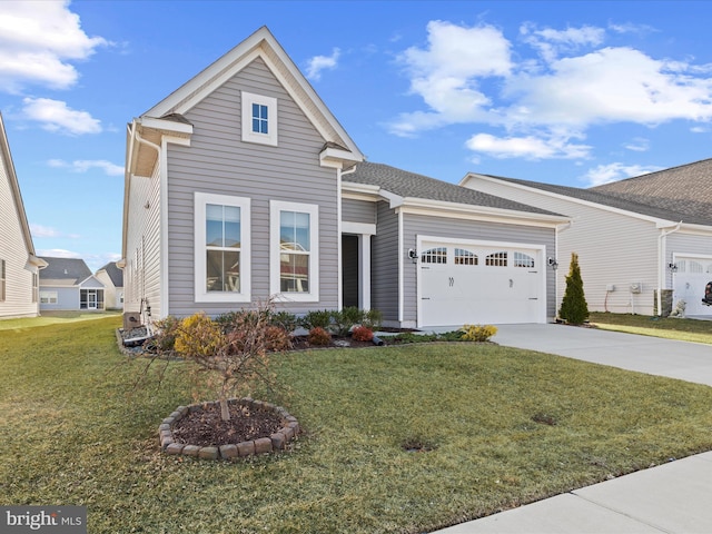 traditional-style home with a garage, concrete driveway, and a front yard