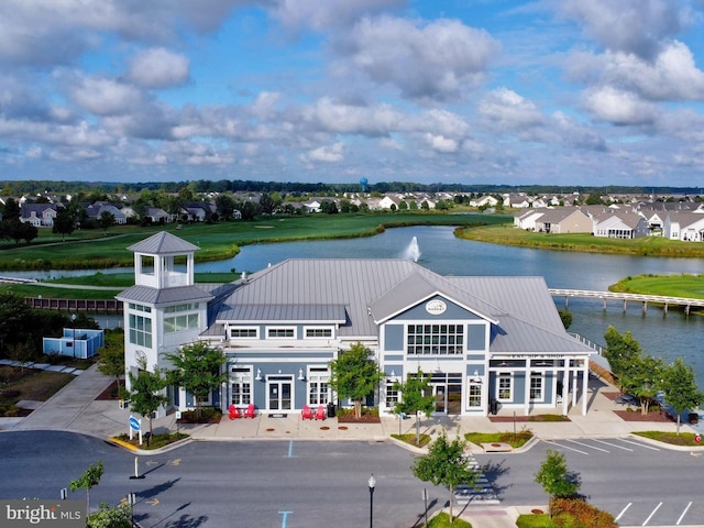 view of building exterior featuring a water view