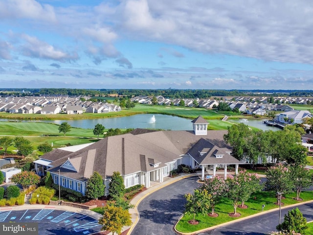 birds eye view of property featuring a residential view and a water view