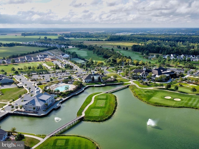 drone / aerial view with a residential view and a water view