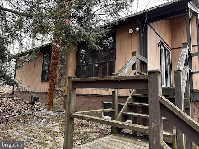 view of home's exterior with stairs