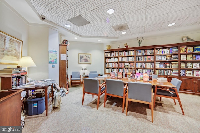 office space with recessed lighting and light colored carpet