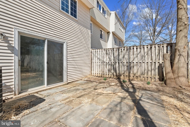 view of patio with fence