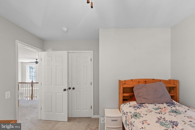 bedroom featuring a closet and carpet flooring