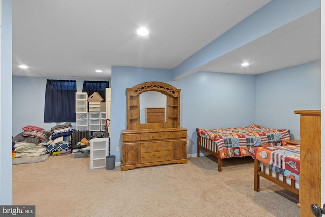 bedroom with carpet floors, baseboards, and recessed lighting