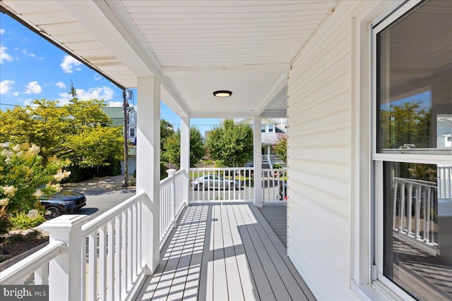 deck featuring covered porch