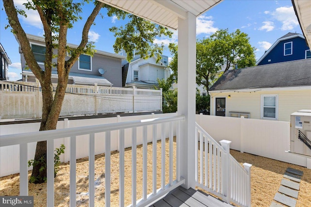 exterior space featuring a residential view and a fenced backyard