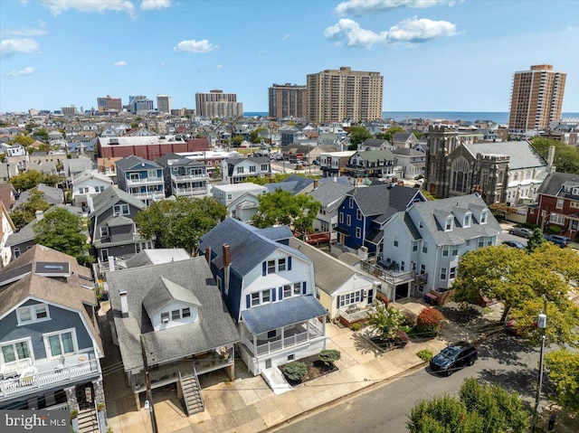 drone / aerial view featuring a city view