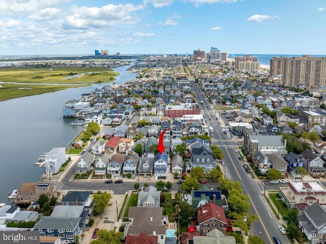 drone / aerial view featuring a water view