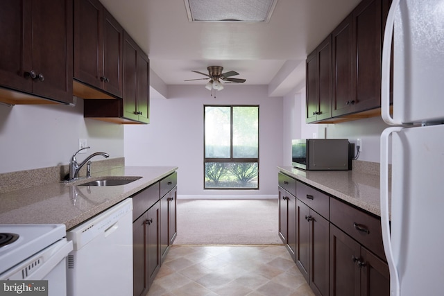 13213 Dairymaid Dr Unit 20, Germantown, MD 20874 - kitchen with a sink, white appliances, light colored carpet, ceiling fan, and dark brown cabinetry