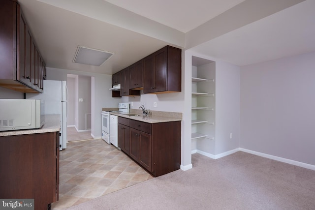 13213 Dairymaid Dr Unit 20, Germantown, MD 20874 - kitchen with under cabinet range hood, white appliances, light countertops, and baseboards