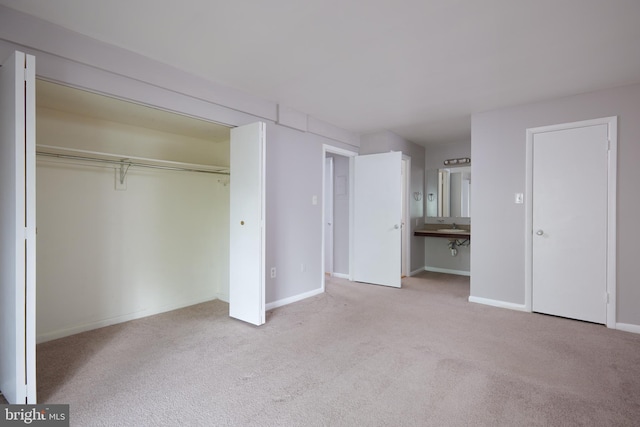 13213 Dairymaid Dr Unit 20, Germantown, MD 20874 - unfurnished bedroom with a closet, baseboards, a sink, and carpet floors