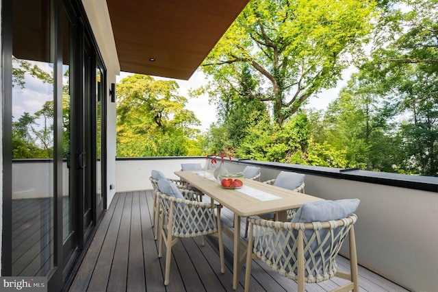 balcony featuring outdoor dining space