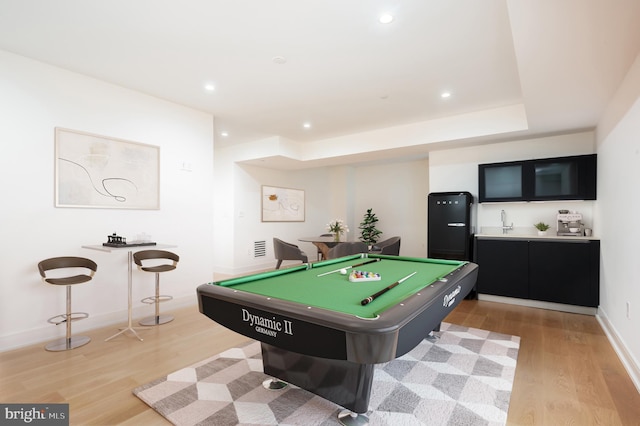 game room featuring baseboards, pool table, light wood-type flooring, and recessed lighting