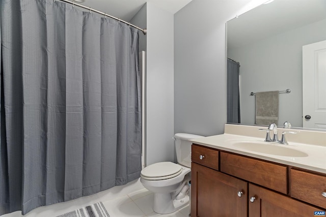 full bath with toilet, curtained shower, vanity, and tile patterned floors