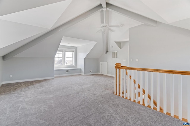 bonus room with lofted ceiling with beams, baseboards, visible vents, and carpet flooring