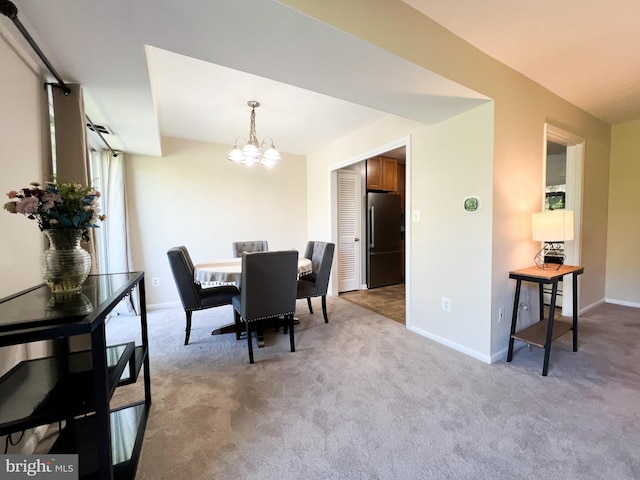 5572 Burnside Dr Unit 5572-3, Rockville, MD 20853 - dining room with baseboards, carpet floors, and a notable chandelier