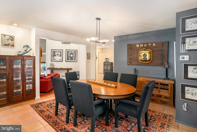 dining area featuring light tile patterned floors, visible vents, and recessed lighting