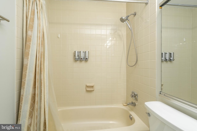 full bathroom with shower / bath combo and toilet