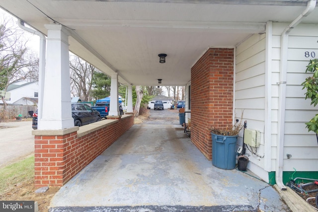 view of patio / terrace featuring a carport