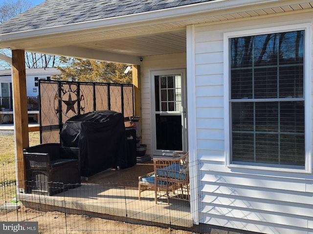 view of patio / terrace with grilling area and fence