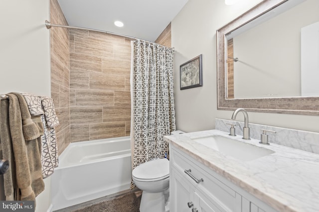 full bathroom featuring vanity, toilet, and shower / bath combo with shower curtain