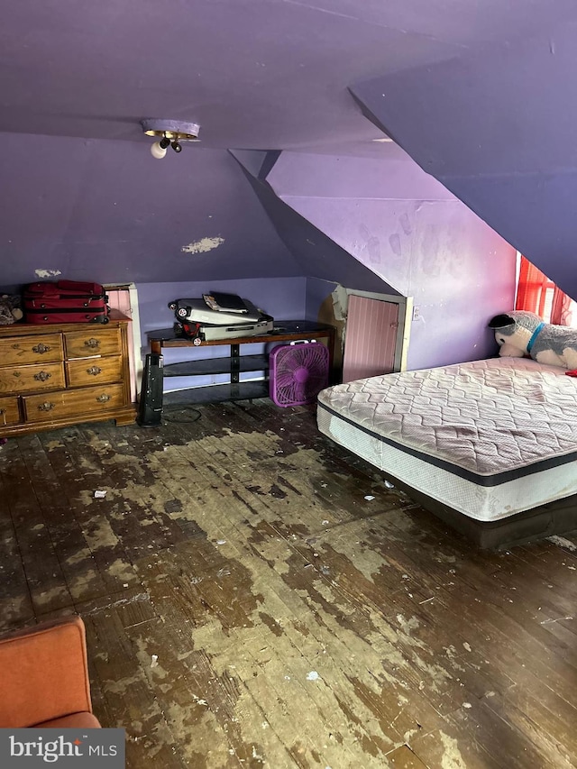 bedroom featuring lofted ceiling