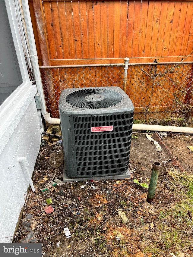 details with central AC unit and brick siding