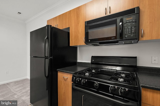 kitchen featuring dark countertops, brown cabinets, carpet, crown molding, and black appliances