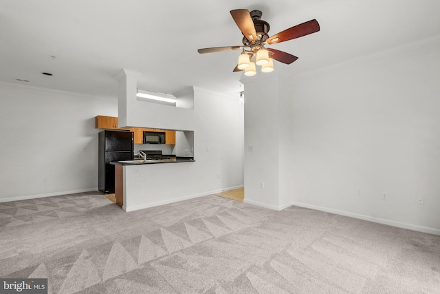 interior space featuring light carpet, baseboards, ornamental molding, and ceiling fan