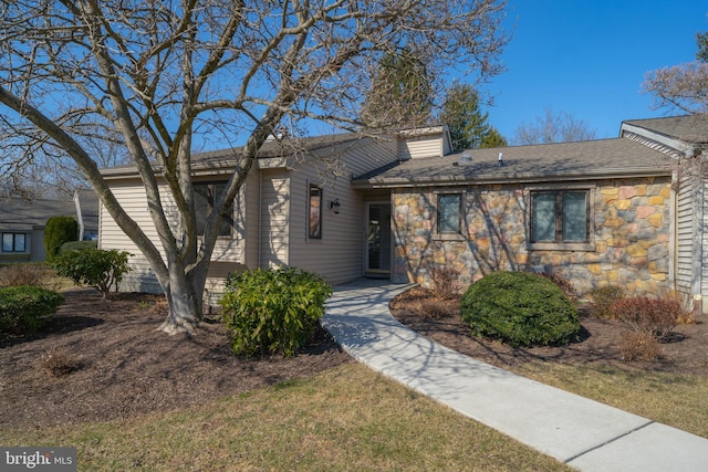 view of front of house featuring stone siding