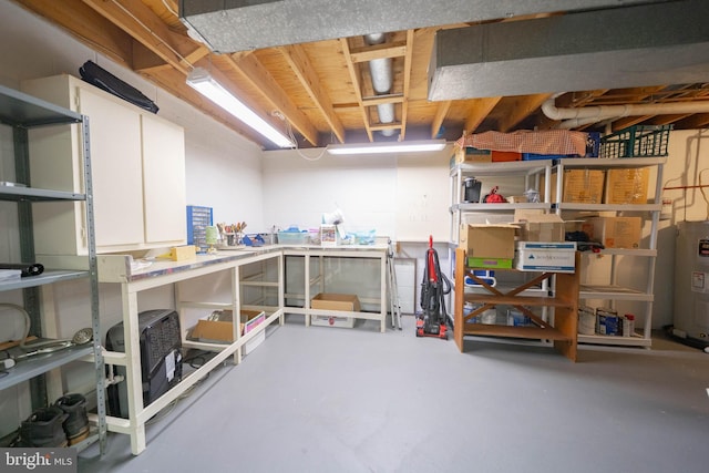 storage area featuring electric water heater