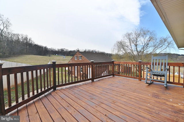 deck featuring a yard