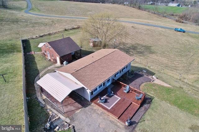 birds eye view of property featuring a rural view