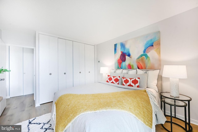 bedroom featuring wood finished floors