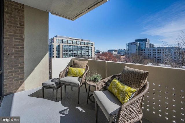 balcony featuring a view of city