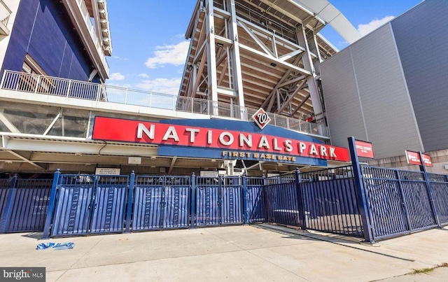 view of building exterior with fence