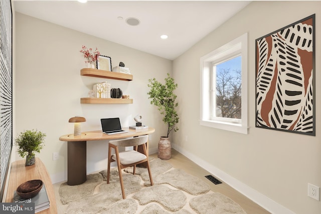 office featuring baseboards, visible vents, wood finished floors, and recessed lighting