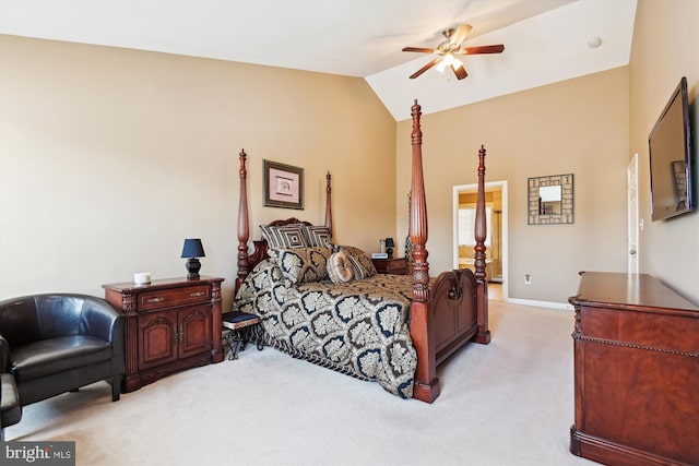 bedroom with baseboards, light carpet, and lofted ceiling