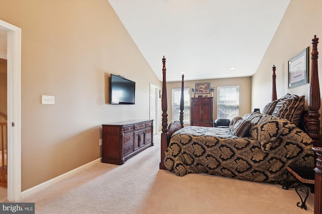 bedroom featuring light colored carpet, high vaulted ceiling, and baseboards