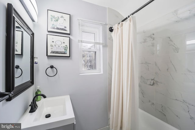 full bath with vanity and a shower with shower curtain