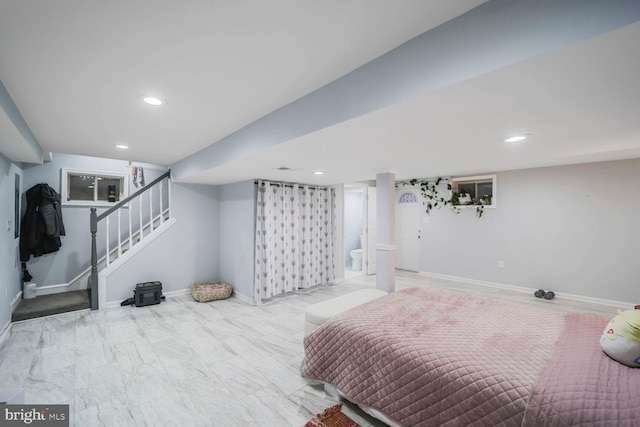 bedroom featuring recessed lighting and baseboards