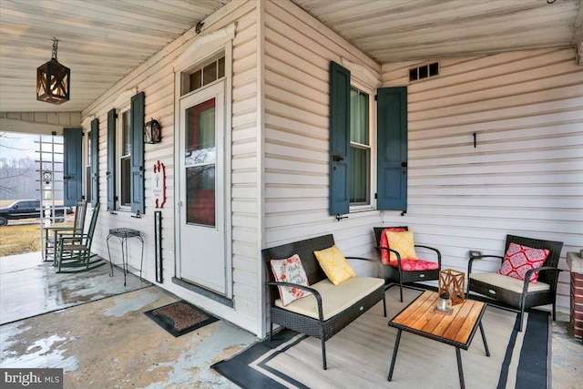 view of patio featuring covered porch