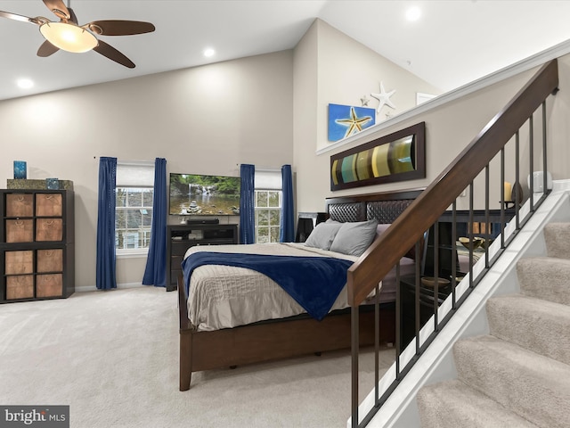 bedroom with carpet, recessed lighting, ceiling fan, high vaulted ceiling, and baseboards