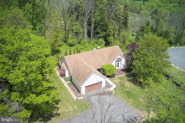 bird's eye view with a forest view